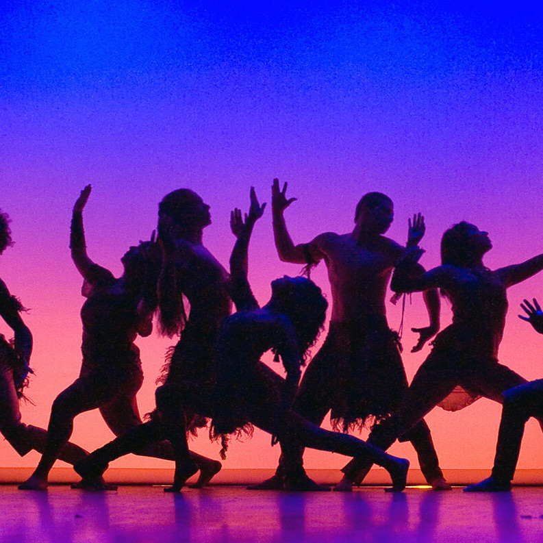 people dancing in silhouette